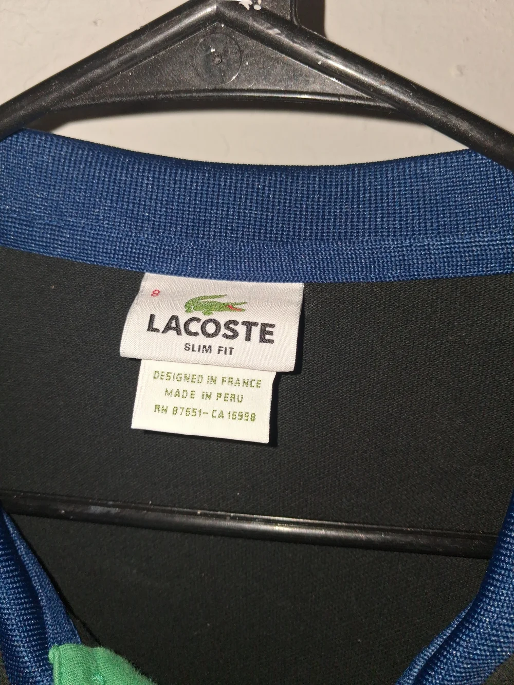 Lacoste Black Polo with Blue Collar and Green Placket